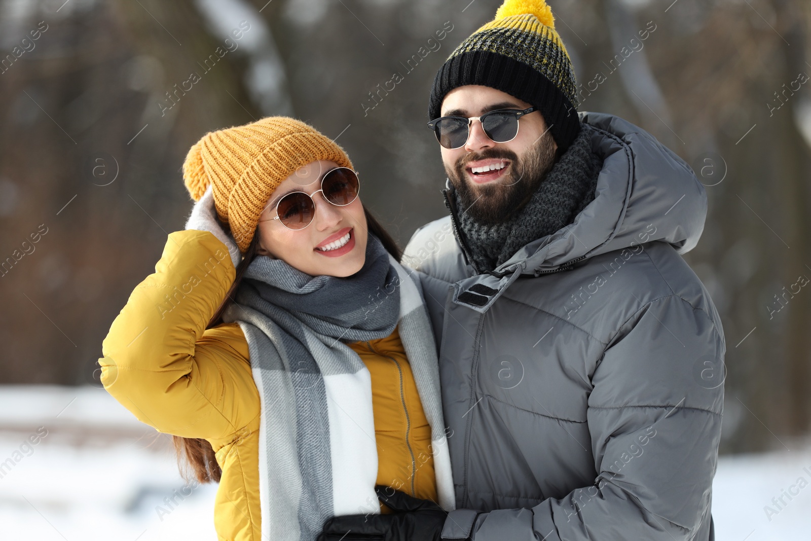 Photo of Beautiful happy couple outdoors on winter day