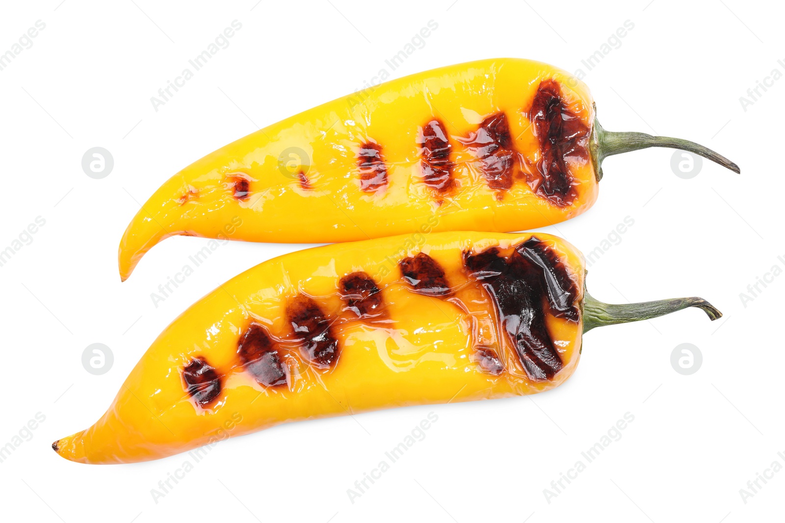 Photo of Tasty grilled yellow peppers isolated on white, top view