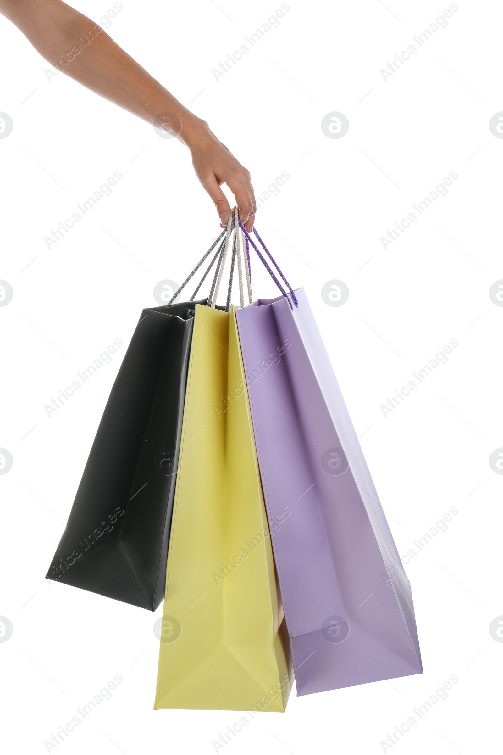 Photo of Woman with paper shopping bags on white background, closeup