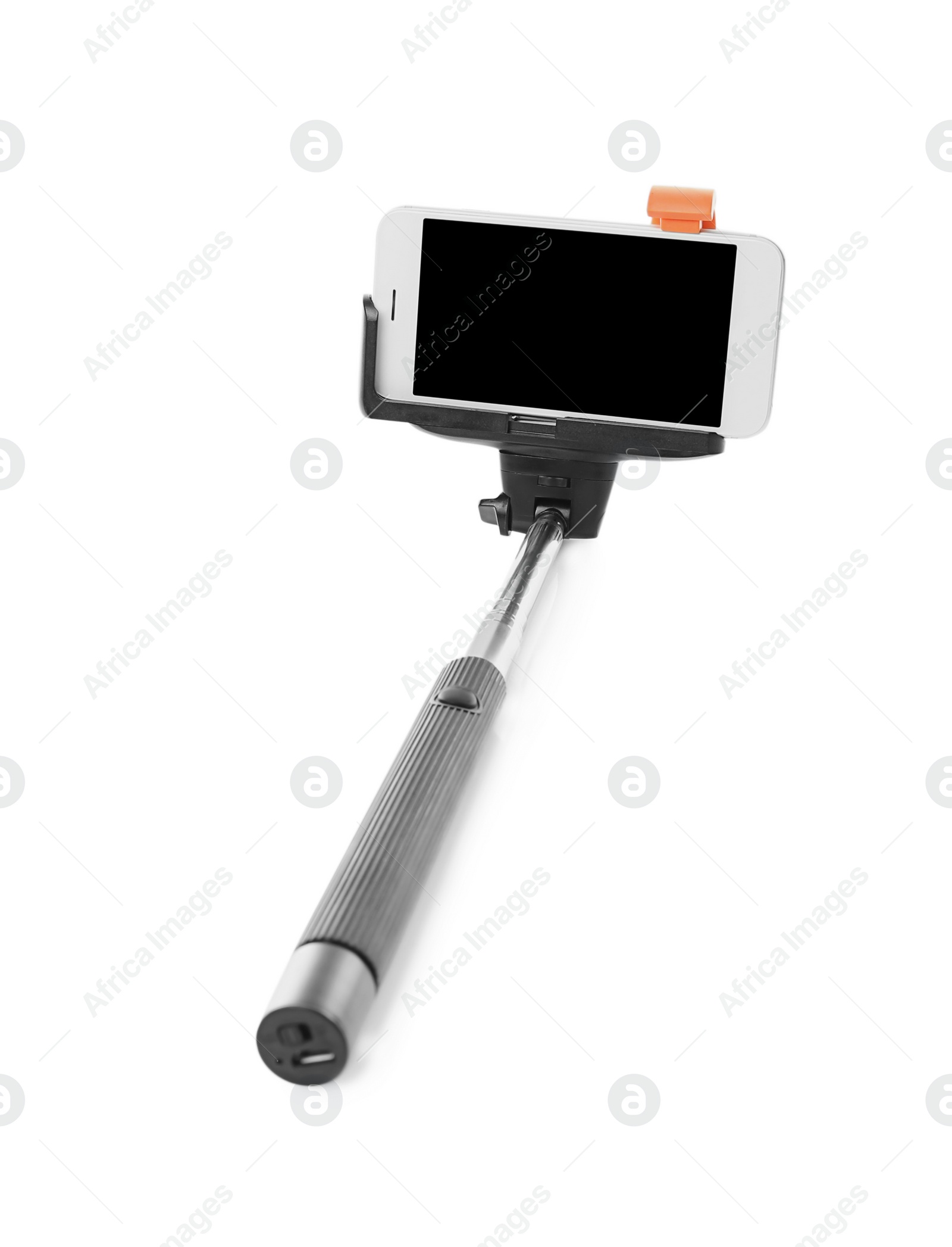 Photo of Selfie stick with mobile phone on white background