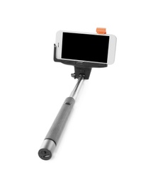 Selfie stick with mobile phone on white background