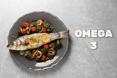 Image of Omega 3. Baked fish with vegetables and rosemary on grey table, top view