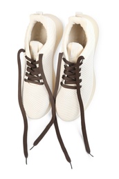 Pair of stylish shoes with laces on white background