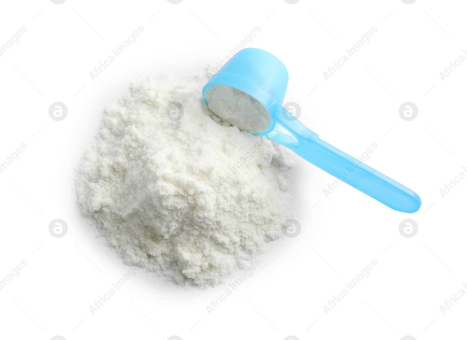 Photo of Powdered infant formula and scoop on white background, top view. Baby milk