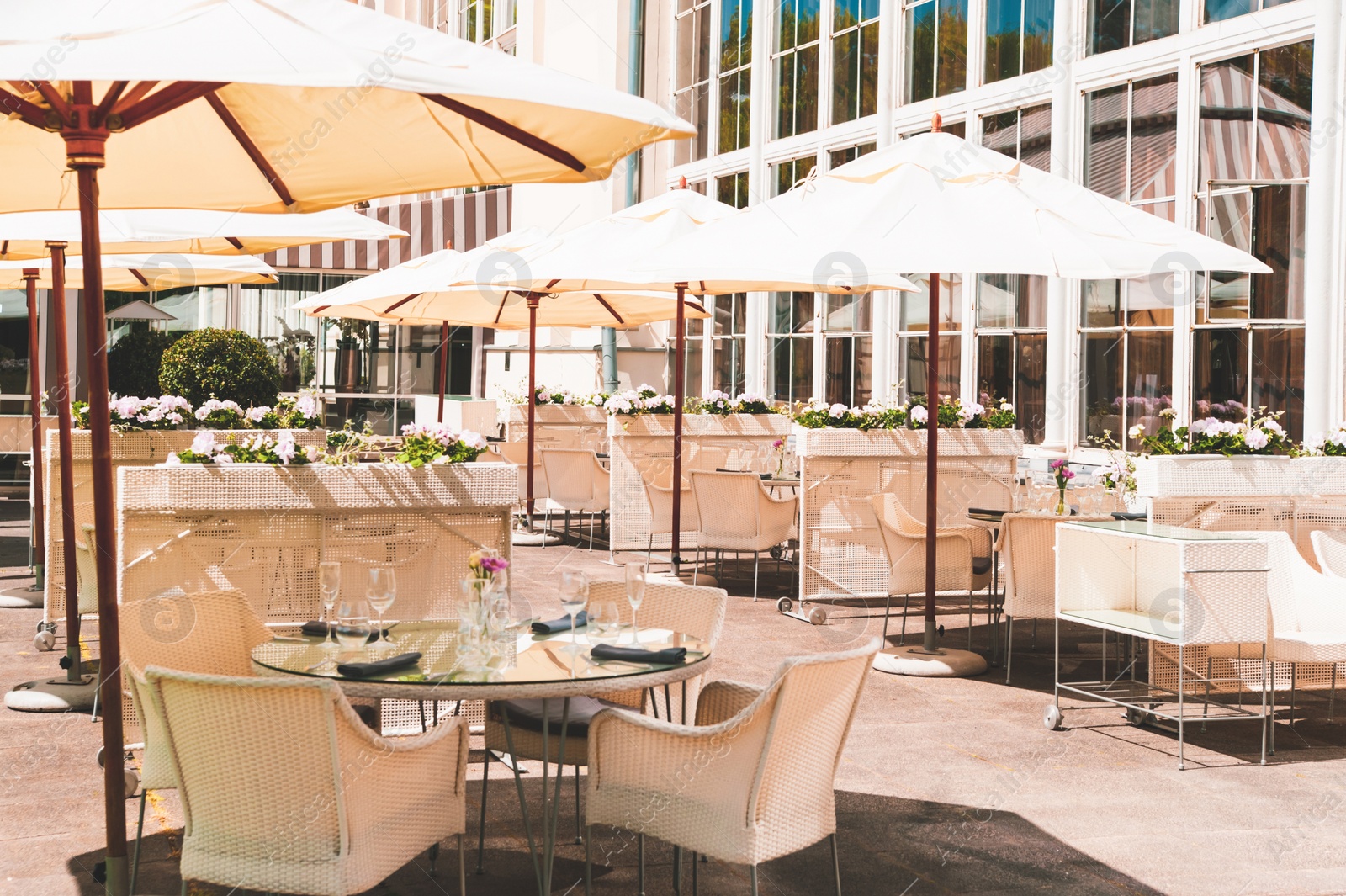 Photo of WARSAW, POLAND - MAY 15, 2022: Beautiful view of cafe with outdoor terrace