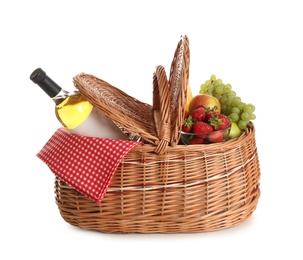 Photo of Picnic basket with wine and fruits isolated on white