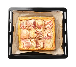 Photo of Baking tray with fresh apple galette isolated on white