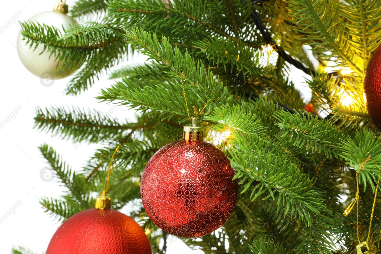 Photo of Beautiful decorated Christmas tree on white background, closeup