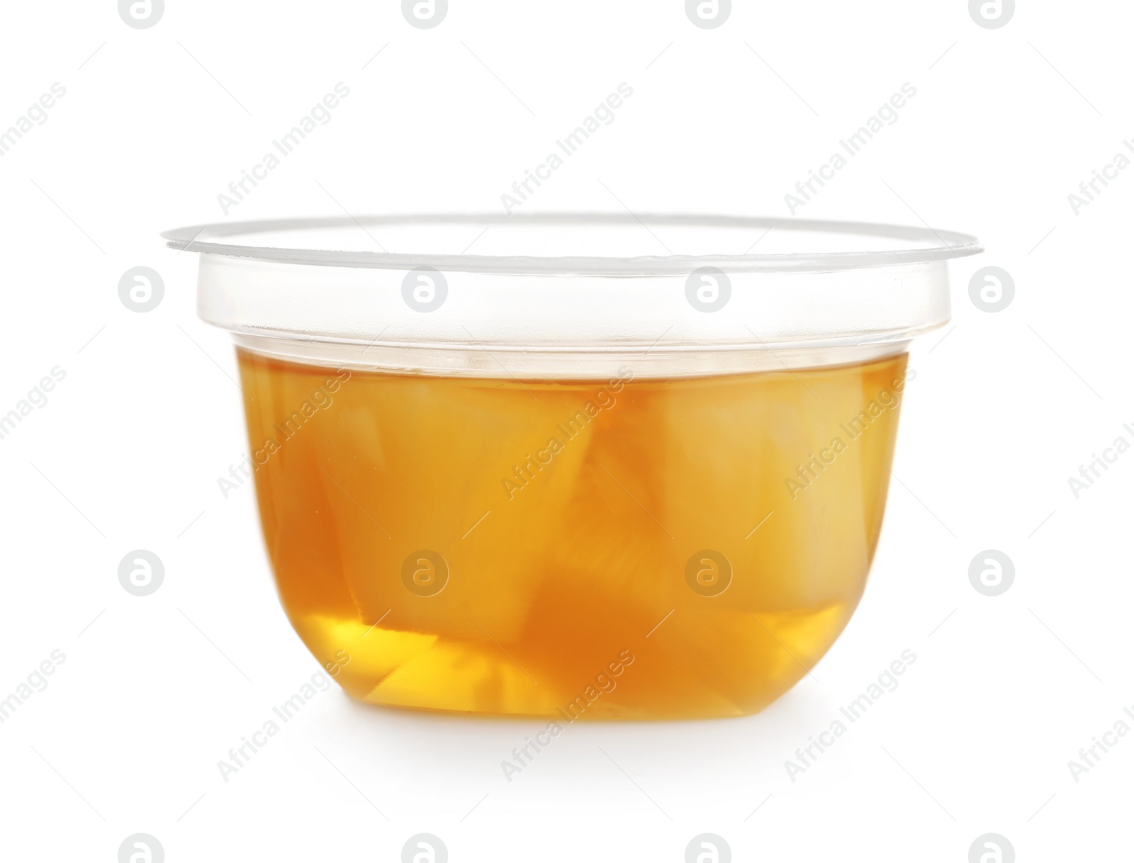 Photo of Plastic container with tasty pineapple jelly on white background