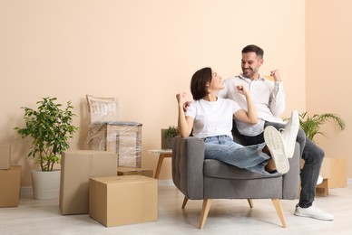 Photo of Happy couple in new apartment. Moving day
