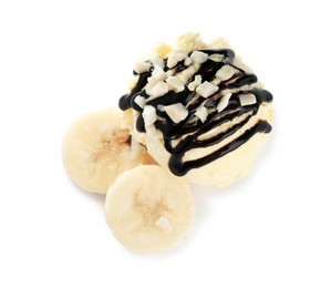 Photo of Delicious banana ice cream with chocolate topping and fresh fruit on white background, top view