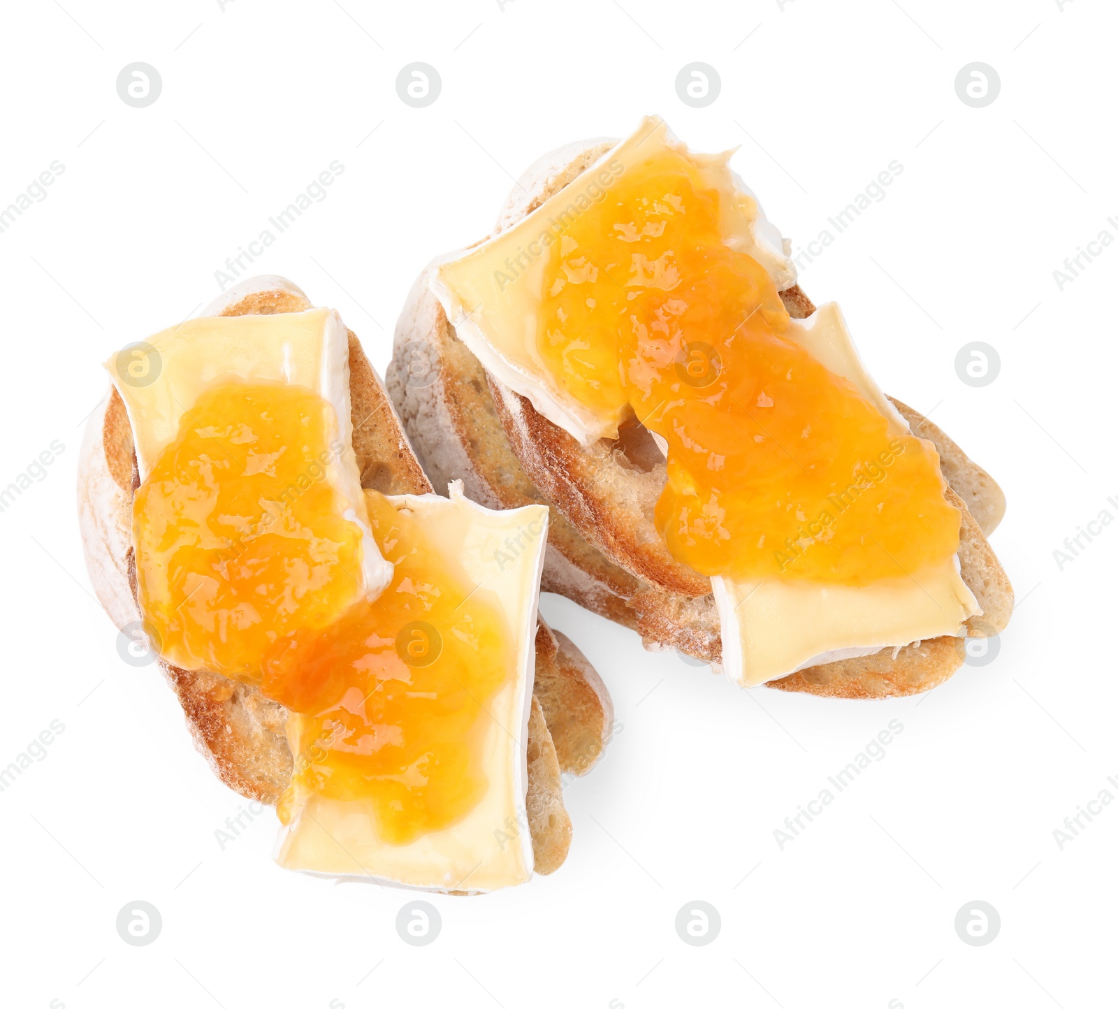 Photo of Tasty sandwiches with brie cheese and apricot jam isolated on white, top view
