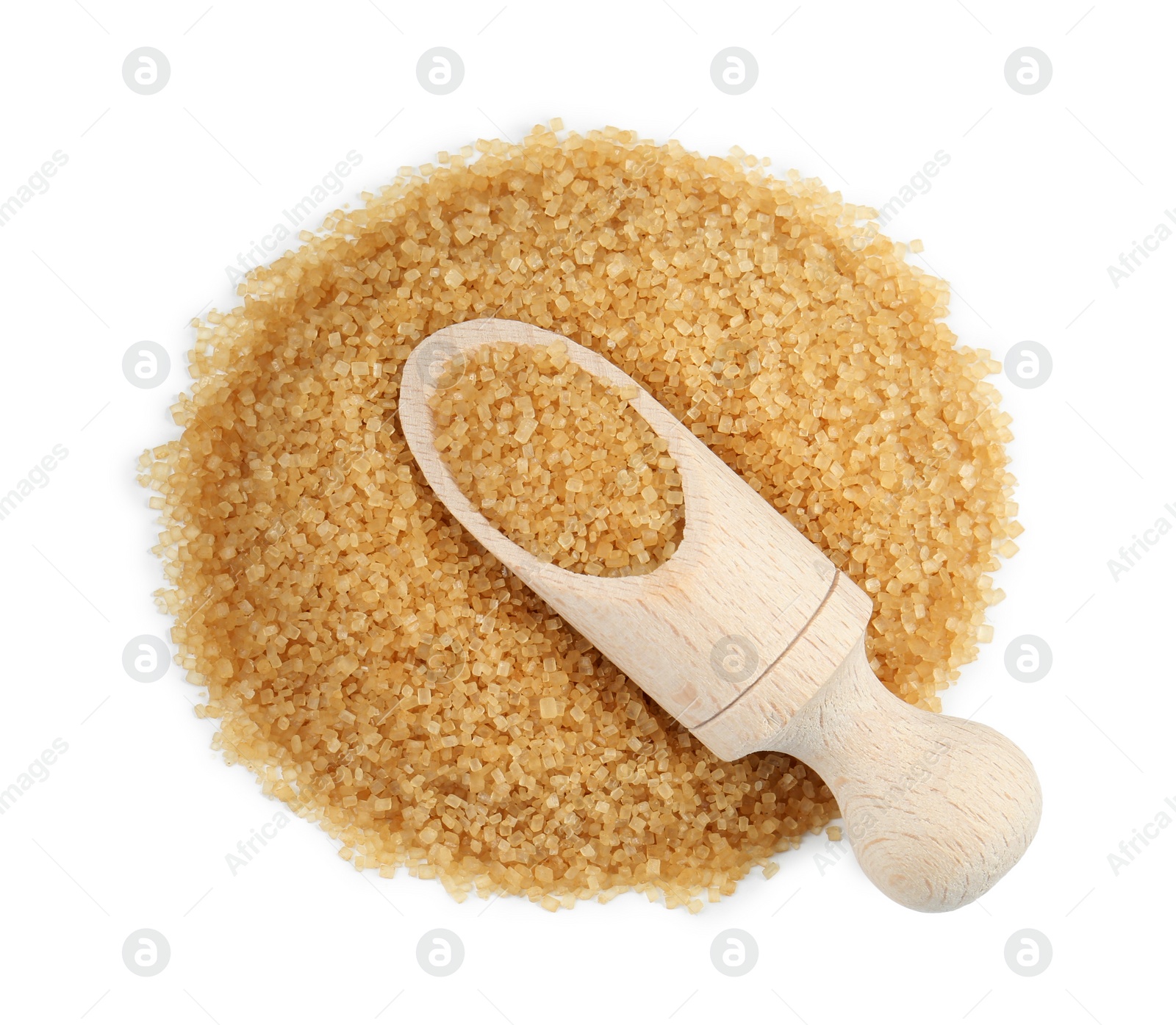 Photo of Pile of brown sugar and scoop isolated on white, top view