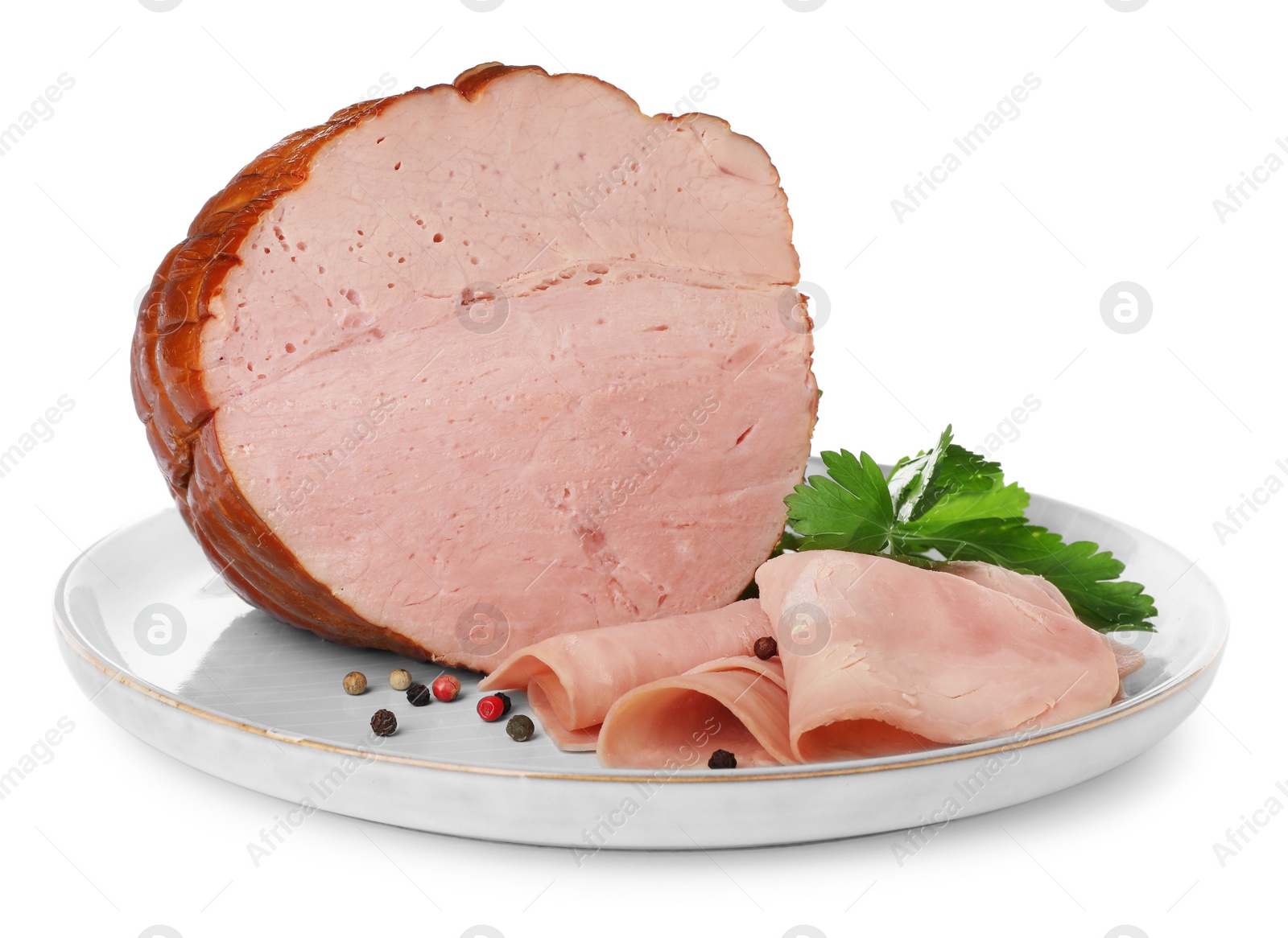 Photo of Delicious sliced ham with parsley and peppercorns isolated on white