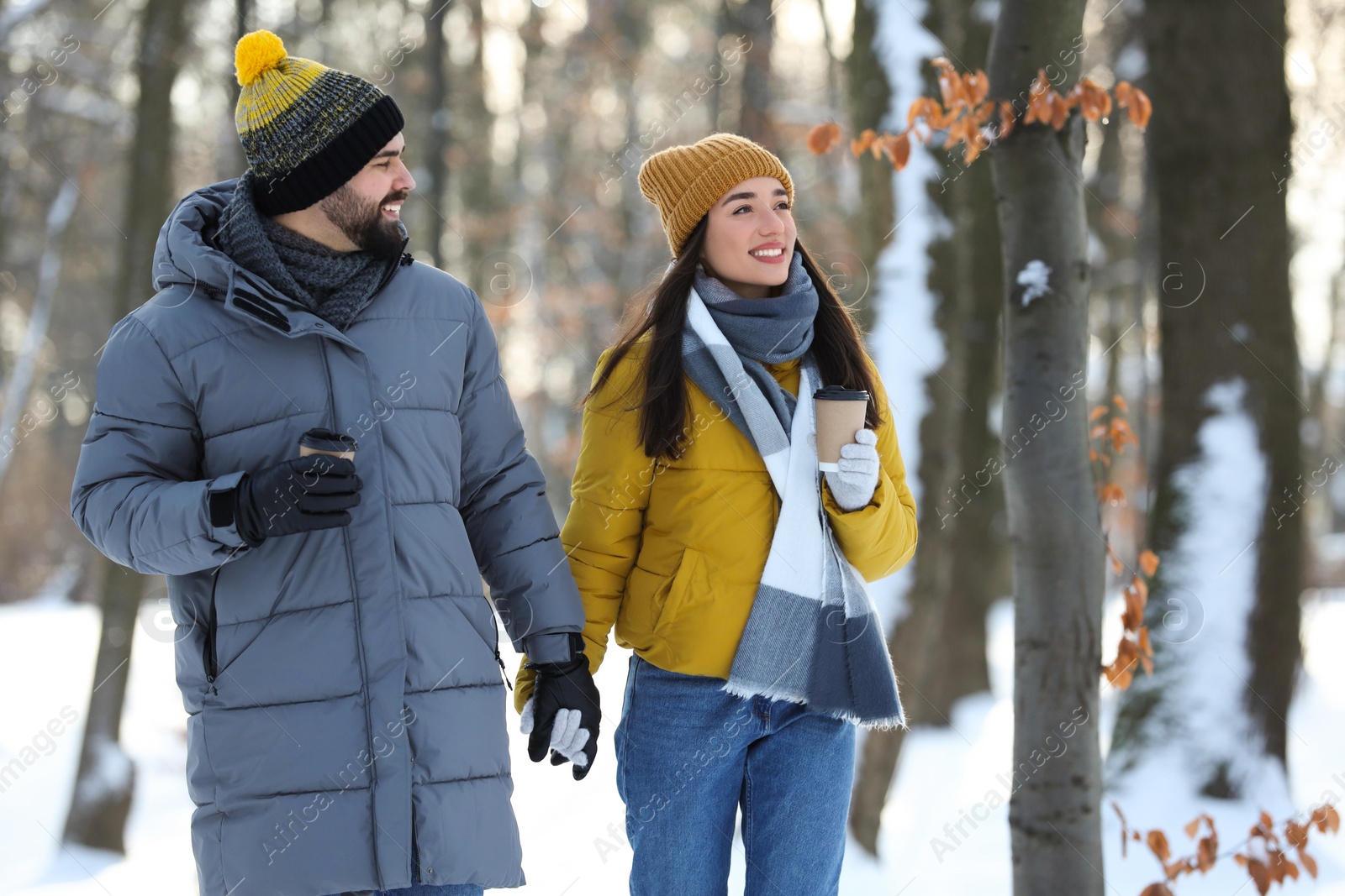 Photo of Beautiful young couple enjoying winter day outdoors