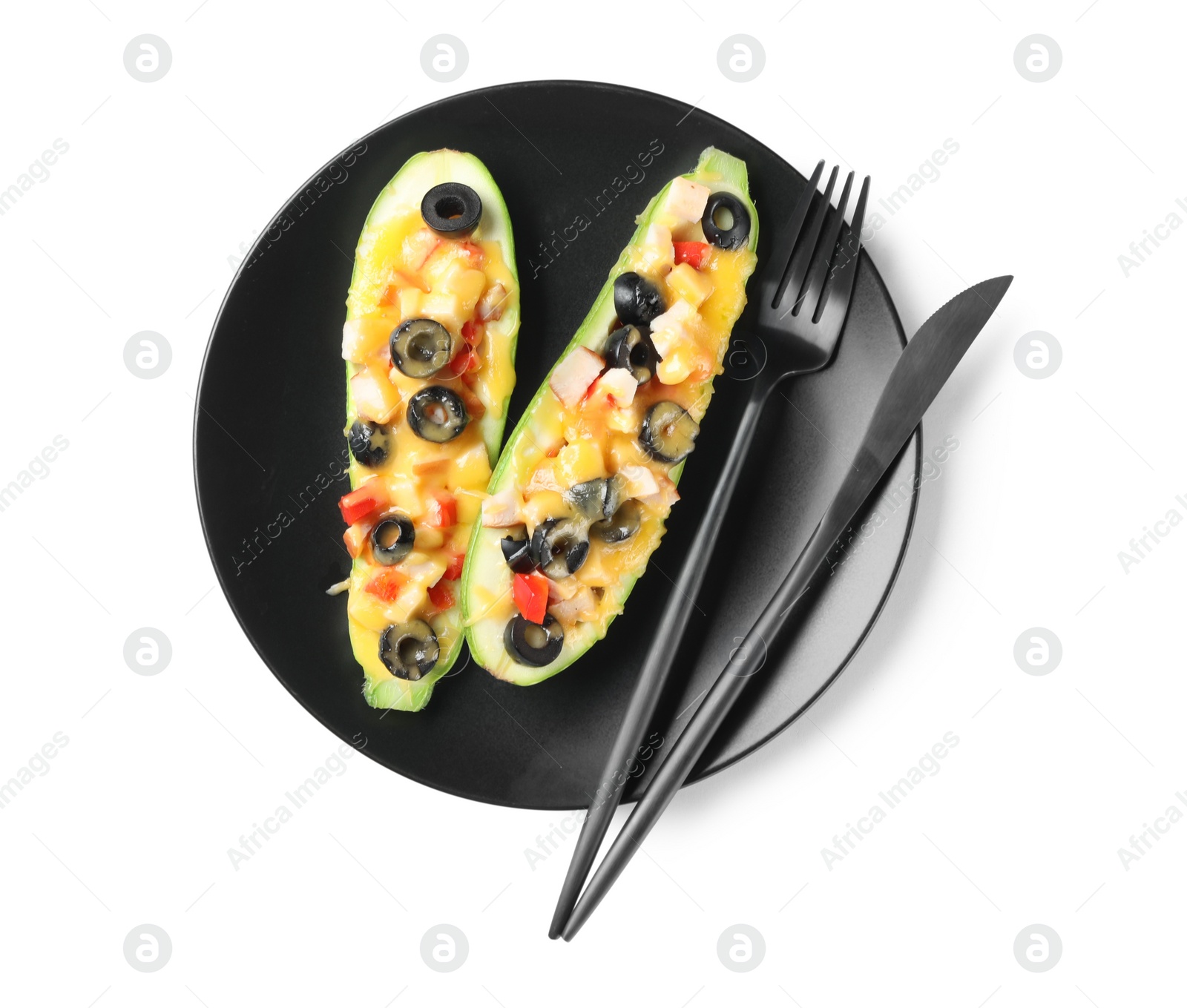 Photo of Plate of delicious stuffed zucchini on white background, top view