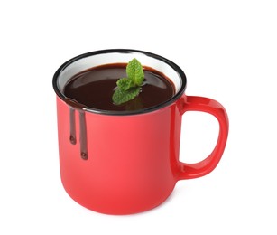 Mug of delicious hot chocolate with fresh mint leaves isolated on white