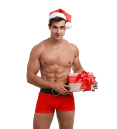 Sexy shirtless Santa Claus with gift on white background