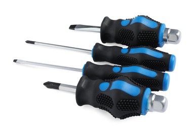 Photo of Set of screwdrivers with blue handles isolated on white