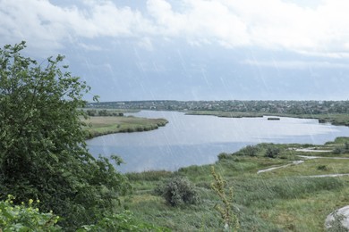 Photo of Beautiful view of river on rainy day