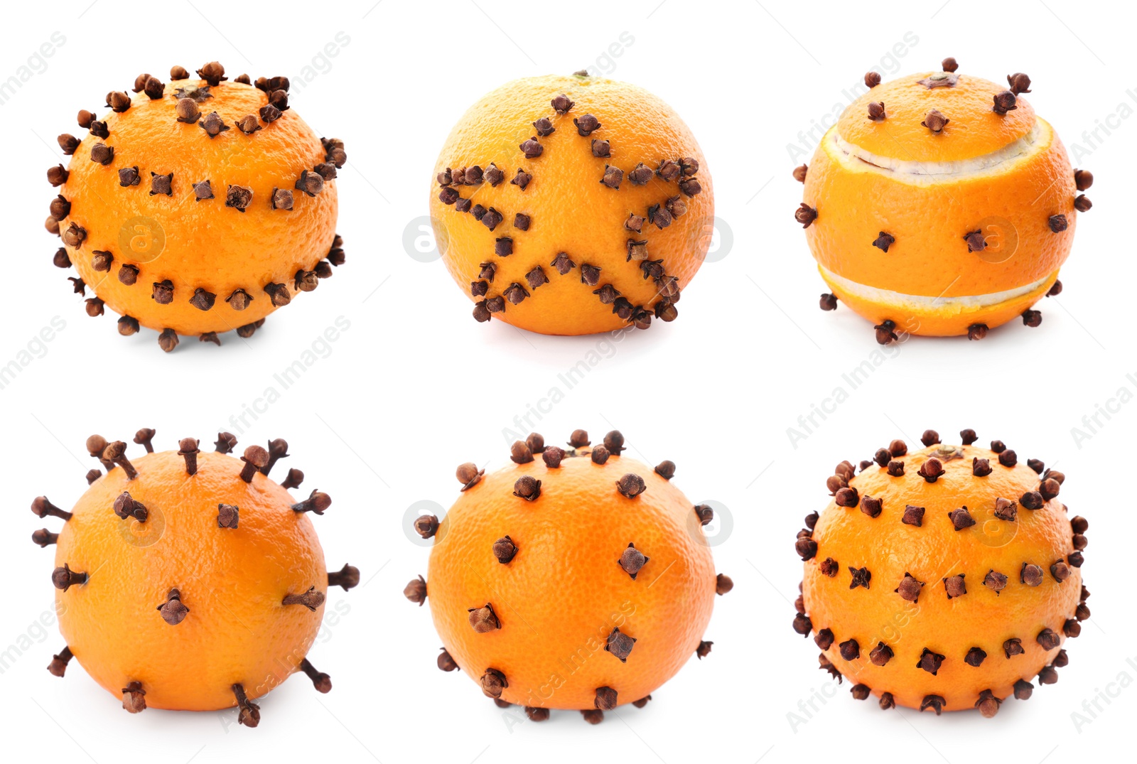 Image of Set with pomander balls made of tangerine and cloves on white background 