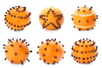 Image of Set with pomander balls made of tangerine and cloves on white background 