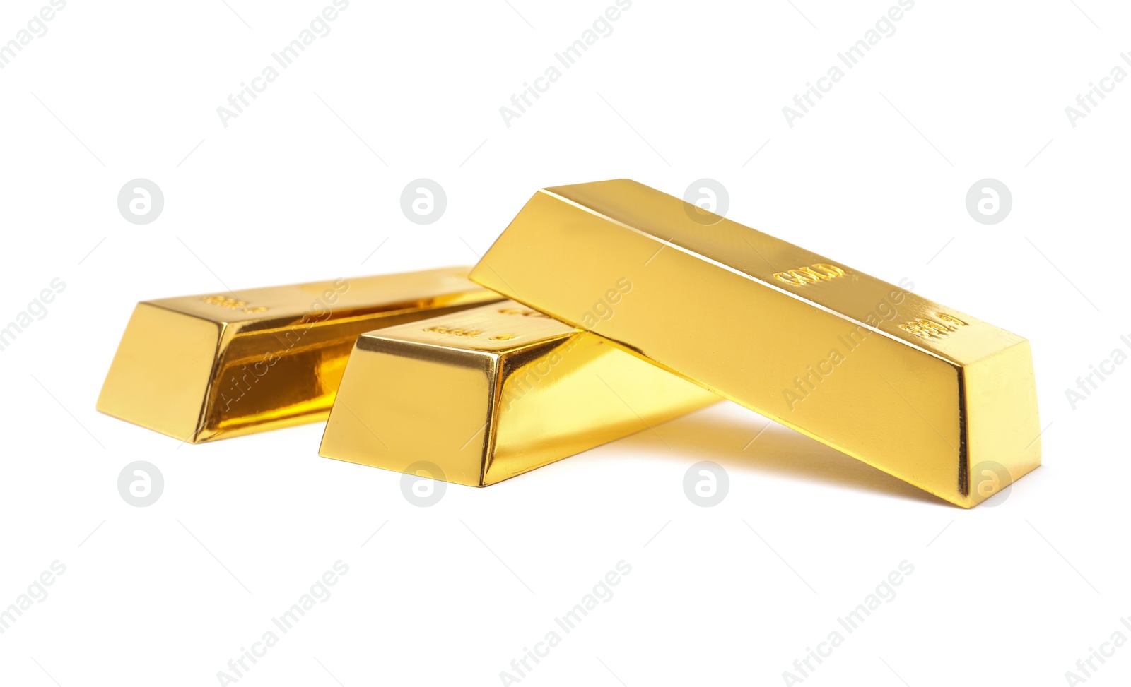 Photo of Precious shiny gold bars on white background