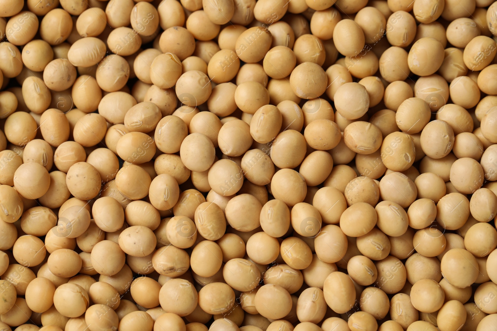 Photo of Heap of soy as background, top view