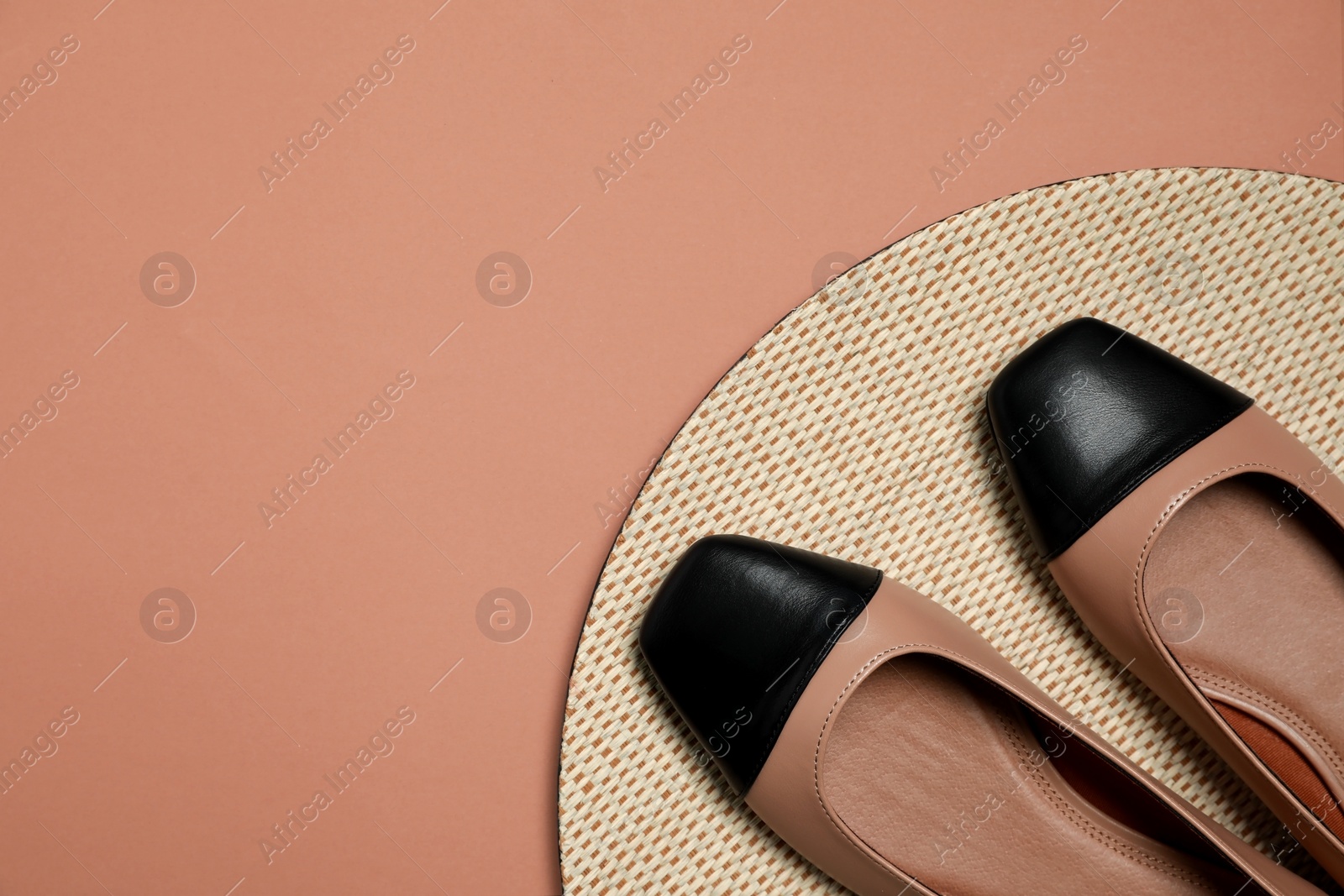 Photo of Pair of new stylish square toe ballet flats on beige background, flat lay. Space for text