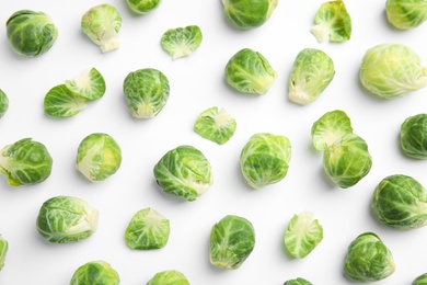 Photo of Fresh Brussels sprouts on white background, top view