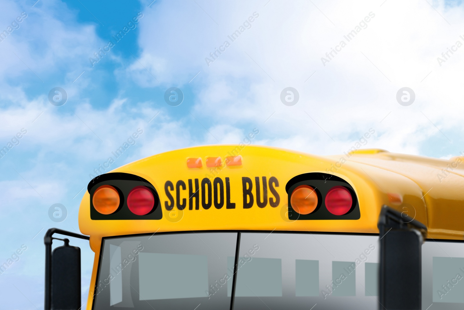 Image of Yellow school bus outdoors, closeup. Transport for students