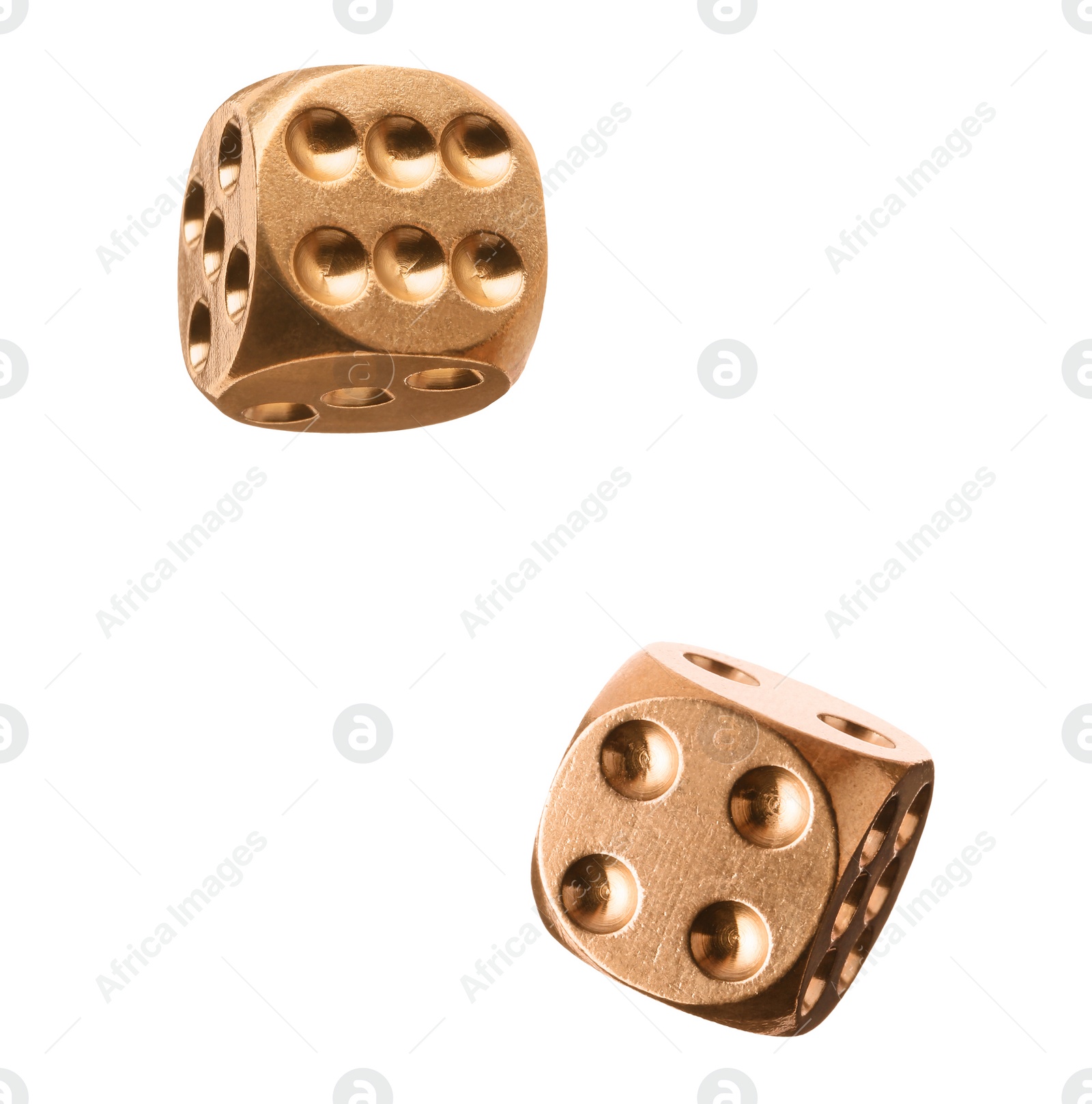 Image of Two golden dice in air on white background