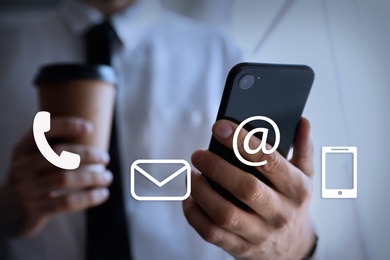 Image of Hotline service. Man with smartphone and different icons, closeup