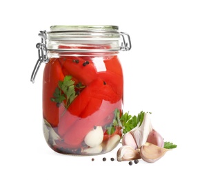 Photo of Glass jar with pickled peppers isolated on white