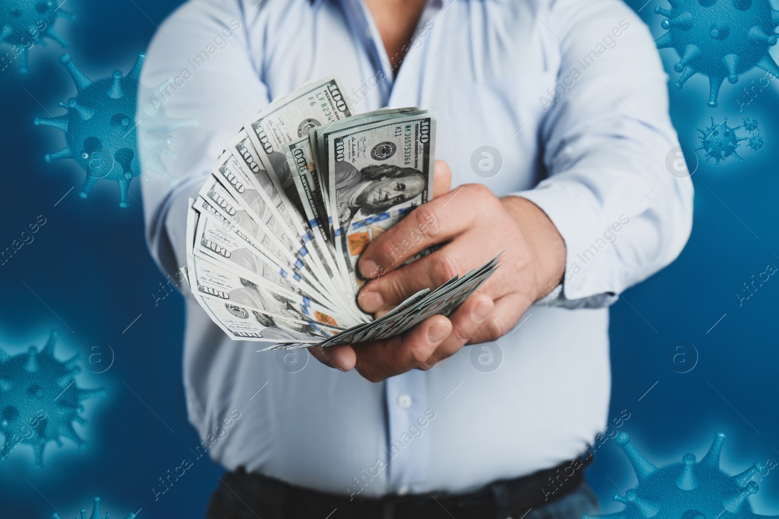Image of Be careful with money during coronavirus outbreak. Senior man with cash on blue background, closeup