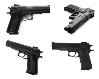 Image of Set with black handguns on white background