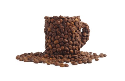 Photo of Cup of drink, composition made with coffee beans isolated on white