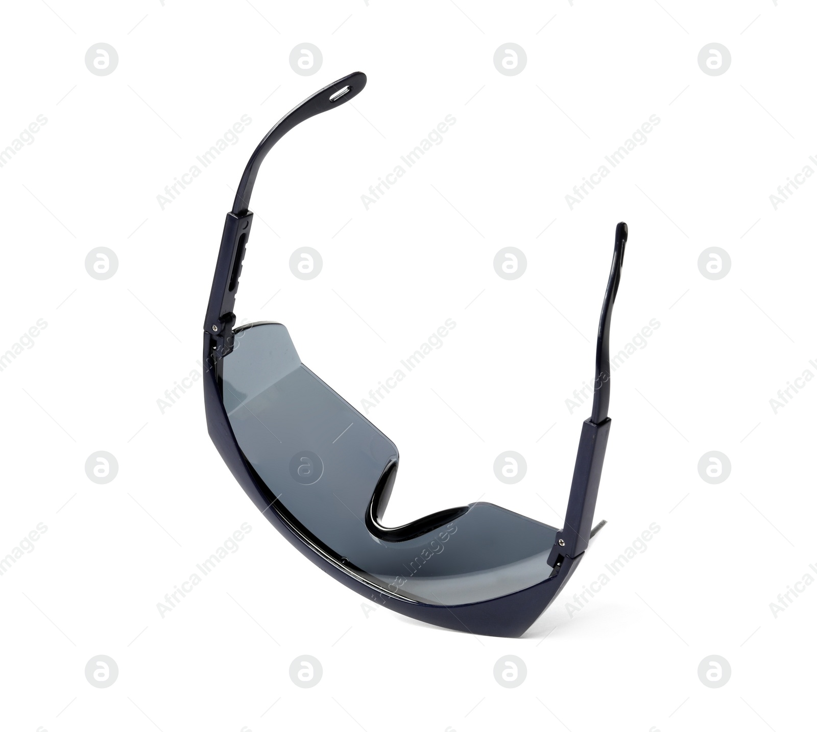 Photo of Protective goggles on white background. Construction tool