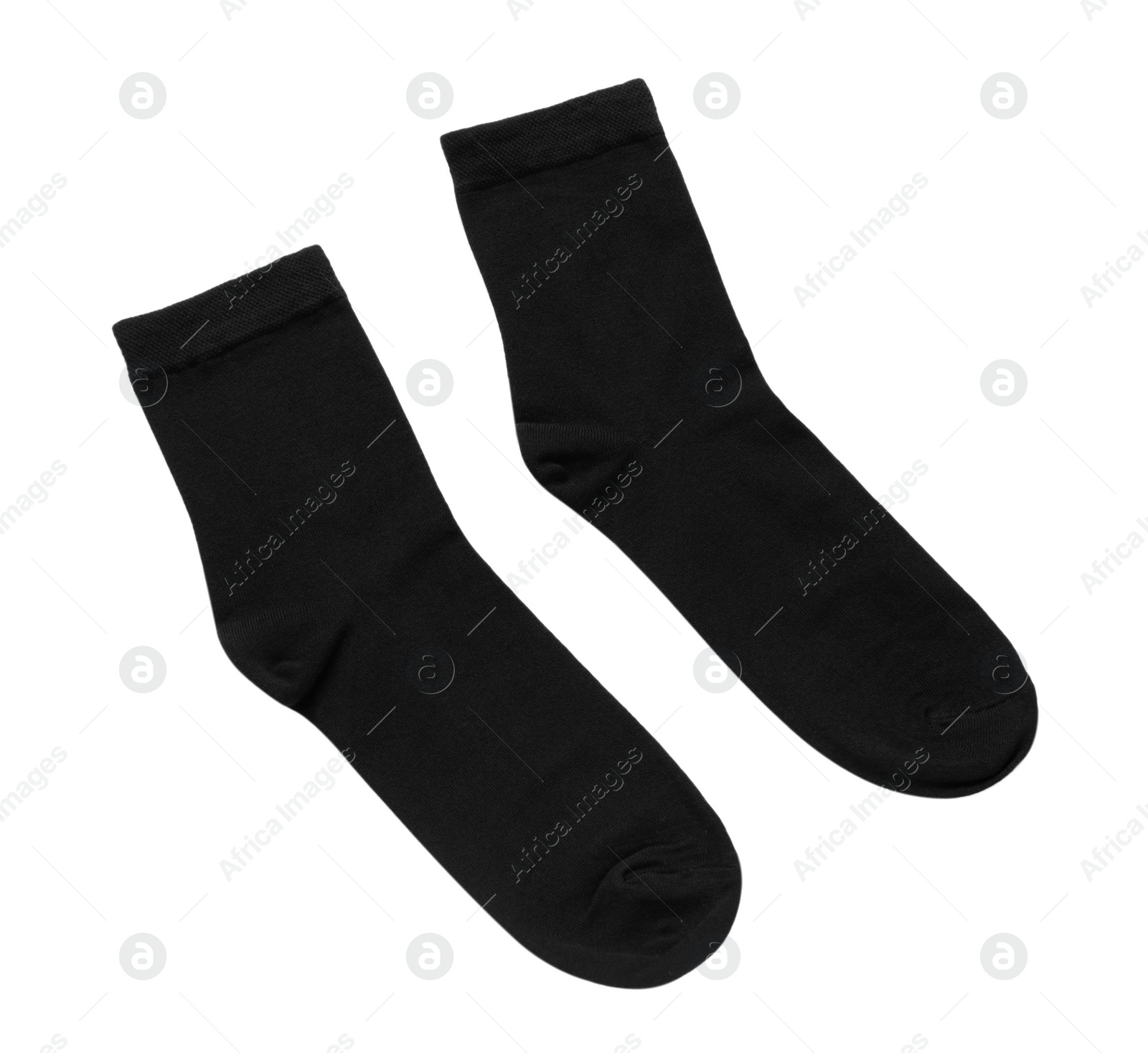 Photo of Pair of black socks isolated on white, top view