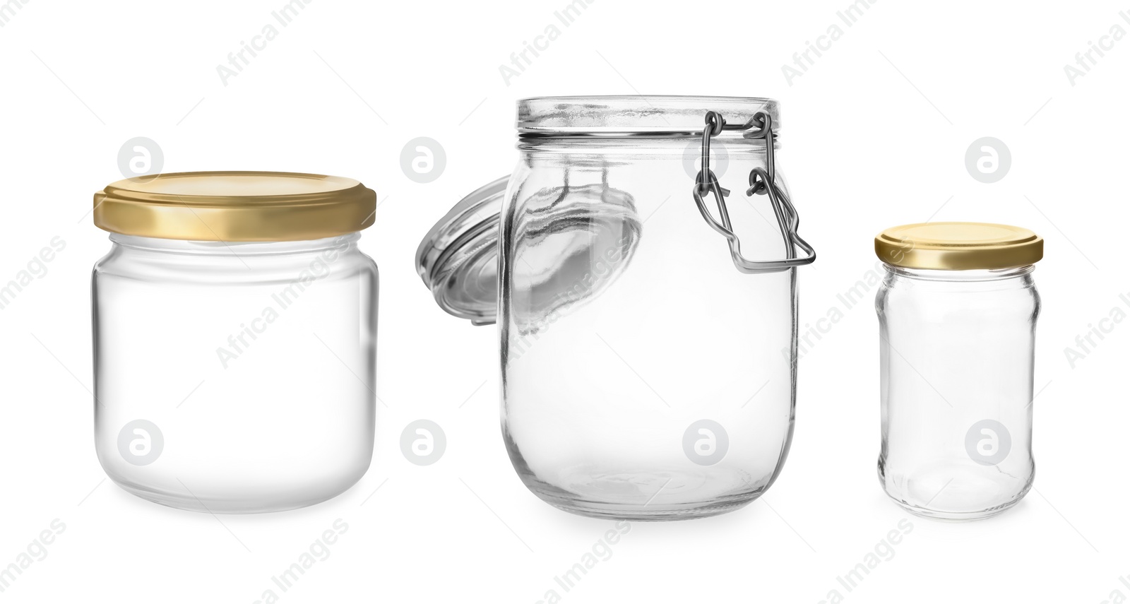 Image of Set with different empty glass jars on white background