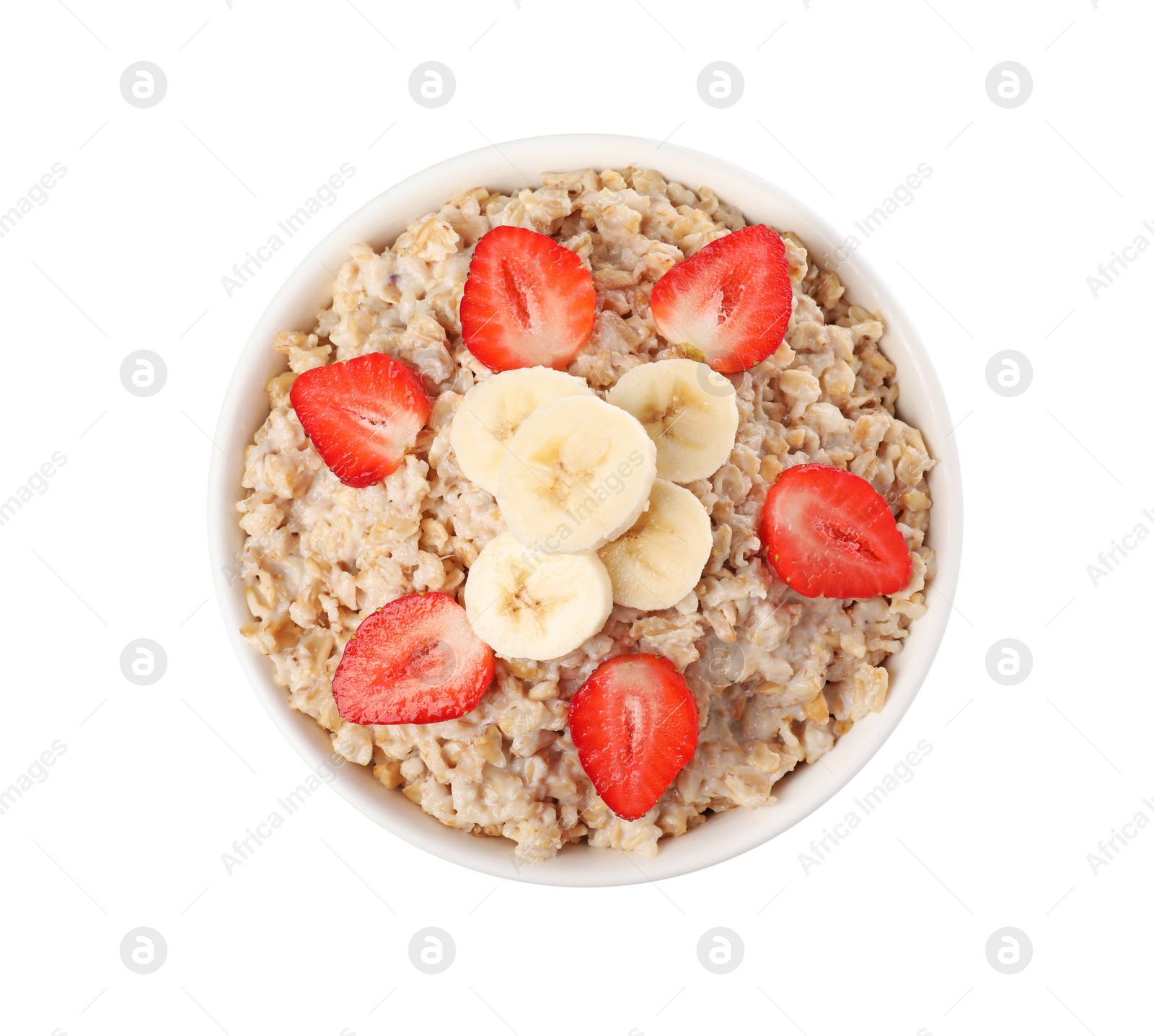 Photo of Tasty boiled oatmeal with strawberries and banana in bowl isolated on white, top view