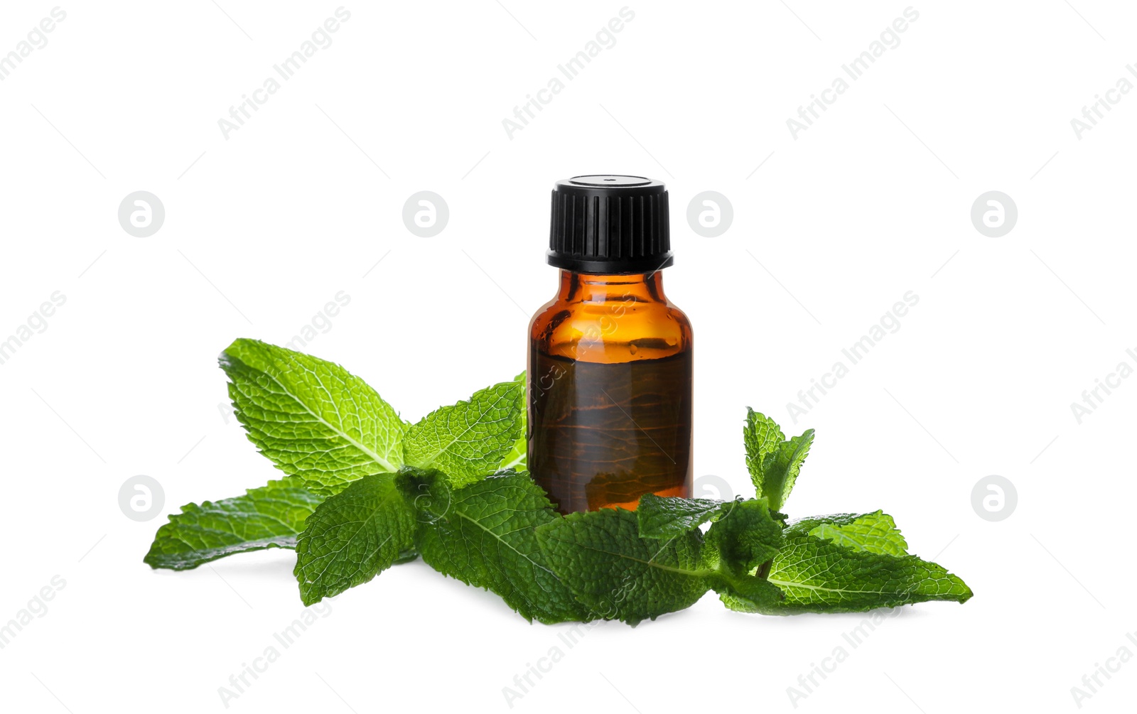 Photo of Bottle of essential oil and mint on white background