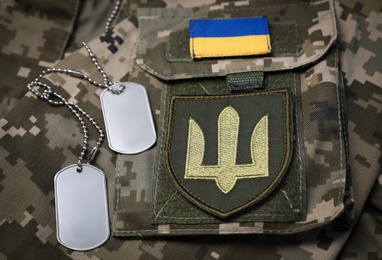 Photo of Composition with Ukraine military outfit, closeup view