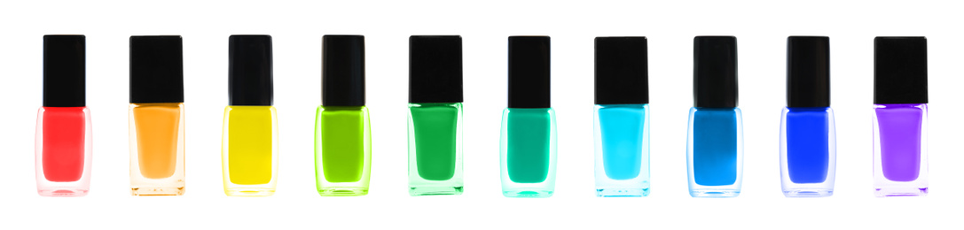 Image of Set of different nail polishes on white background. Banner design