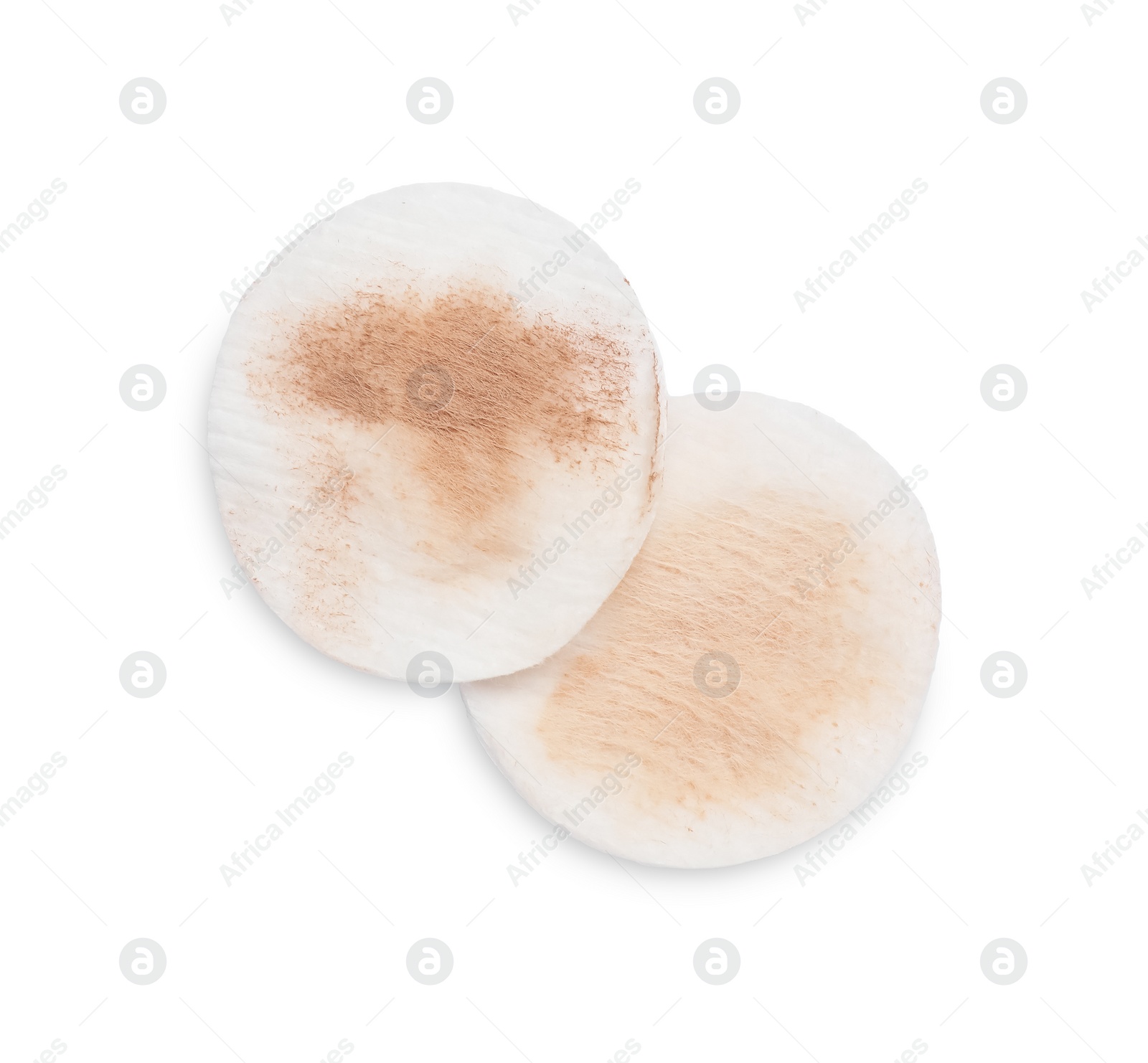 Photo of Dirty cotton pads after removing makeup on white background, flat lay