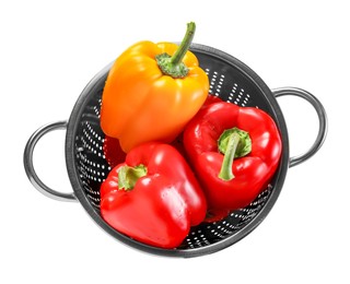 Photo of Colander with fresh bell peppers isolated on white, top view