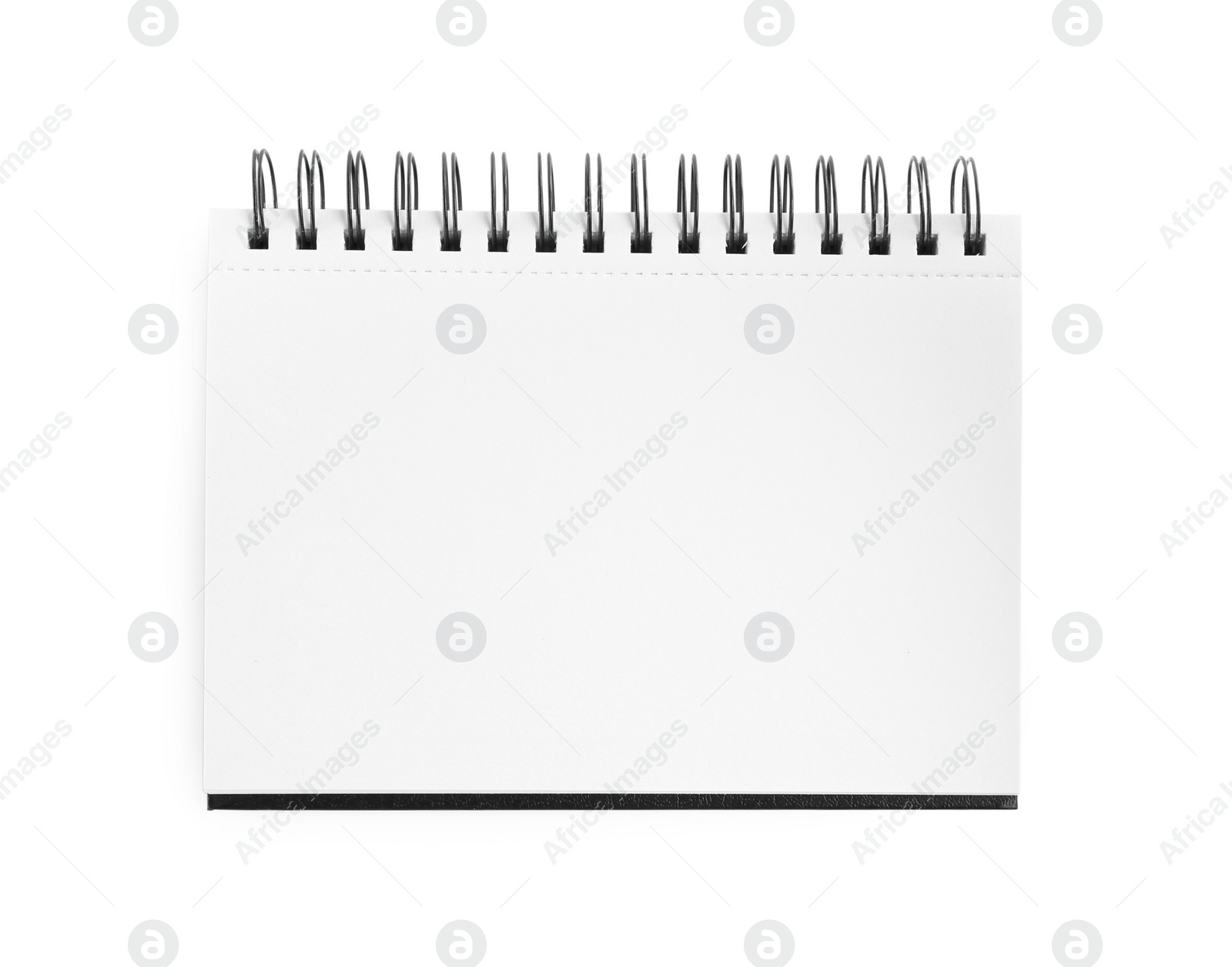 Photo of One notebook isolated on white, top view