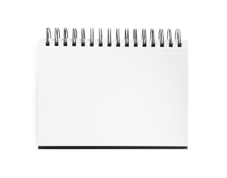 Photo of One notebook isolated on white, top view