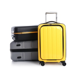 Photo of Modern suitcases for travelling on white background