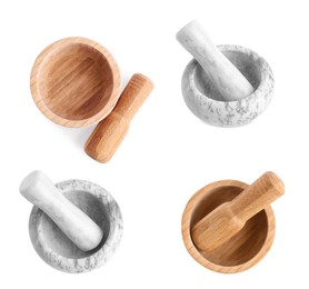 Set of wooden and stone mortars on white background